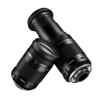  From 18-400mm zoom settings, the length extends from 124mm to 216mm (253mm with hood)