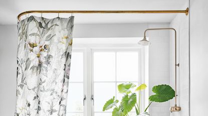 floral shower curtain over bath