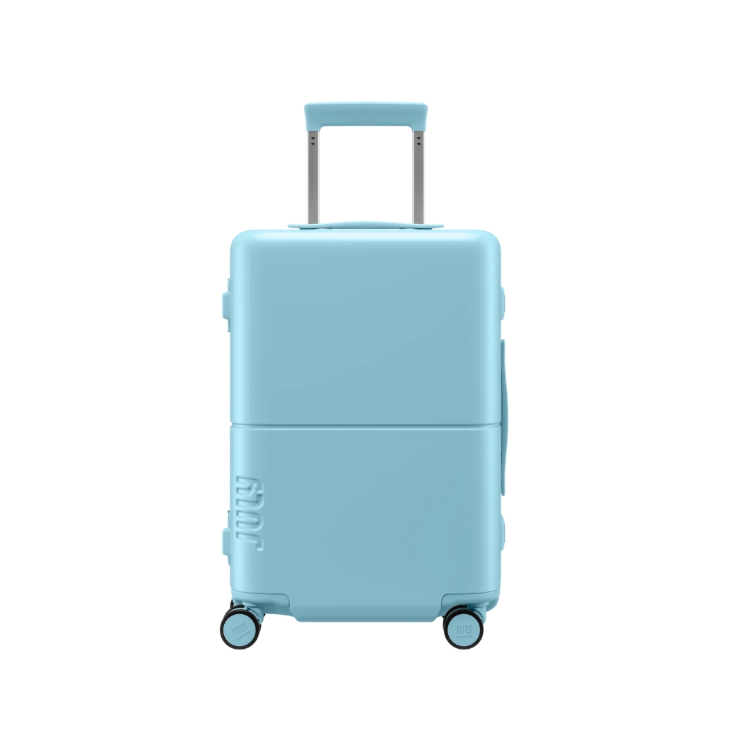 July Carry On Trunk suitcase in coastal blue.