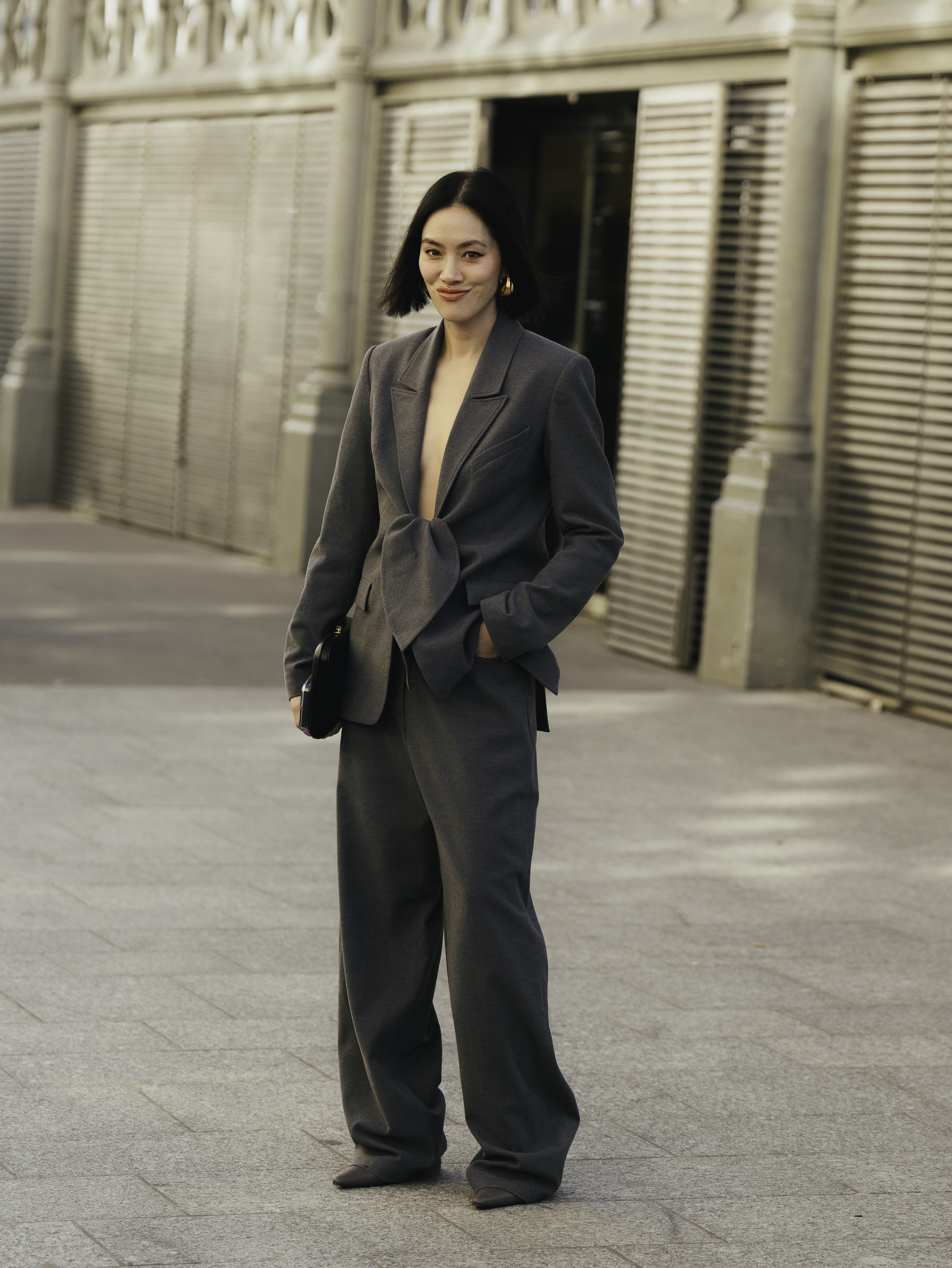 woman wearing gray suit
