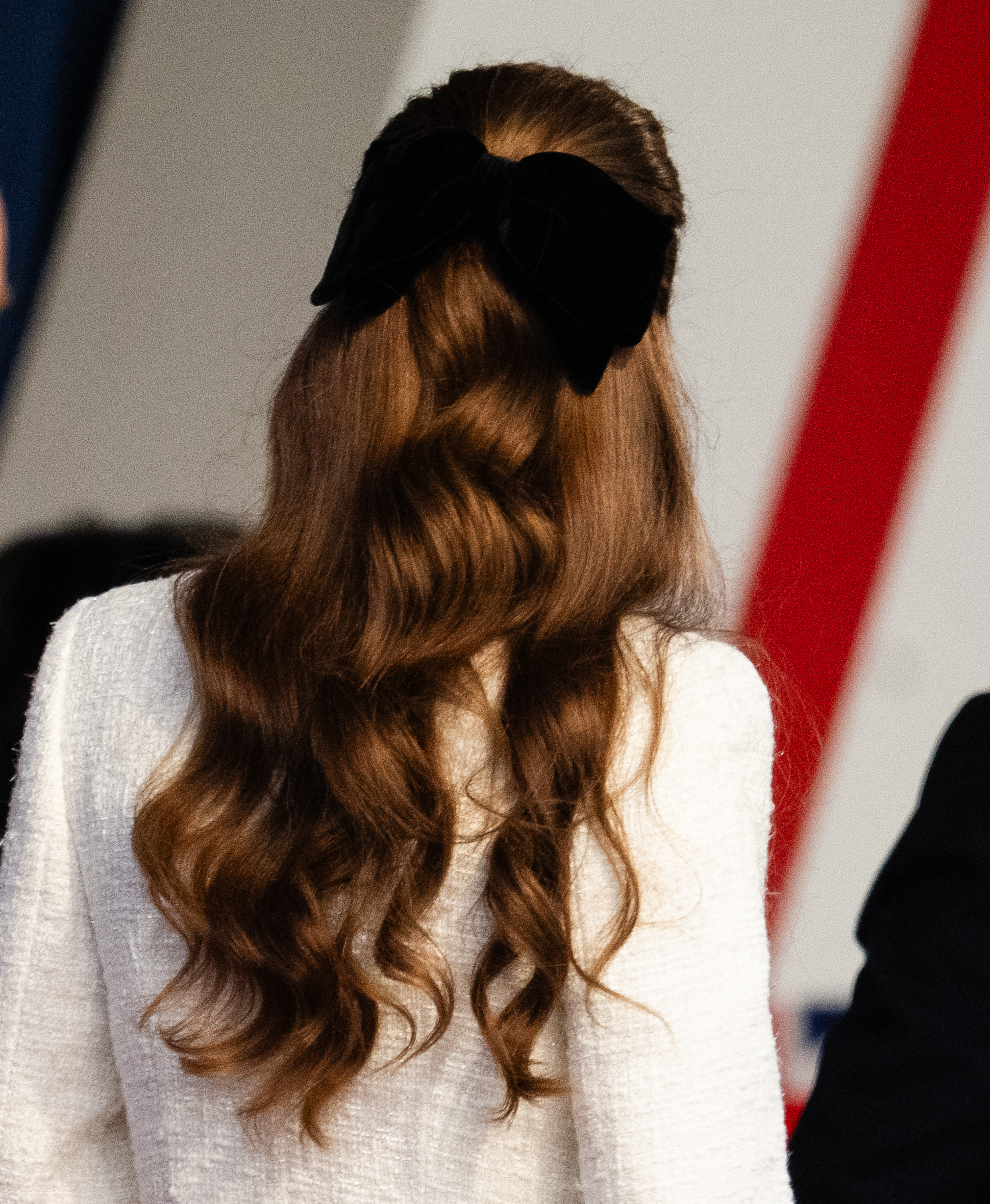 The back of Kate Middleton&#039;s head with her hair half back in a black bow