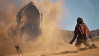 Dune: Awakening Twitch Drops - A sandworm emerging from the sand as people run away and someone falls on their knees. 