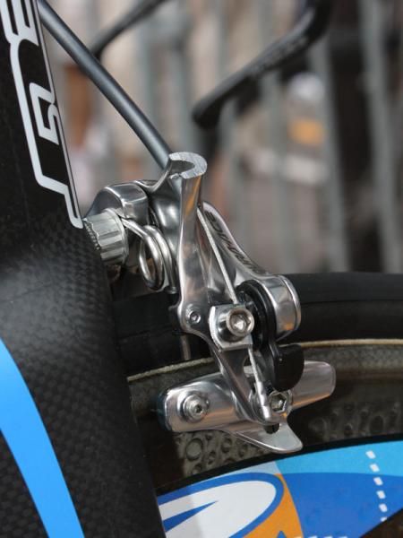 The extra-low base bar positions used by some of the Garmin-Slipstream team forced team mechanics to modify the front brake calipers for a smoother cable route.