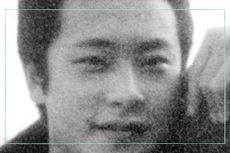 A close up, grainy black and white photo of Joji Obara