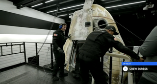 Dragon capsule hatch opens after splashdown and recovery on Sept.15