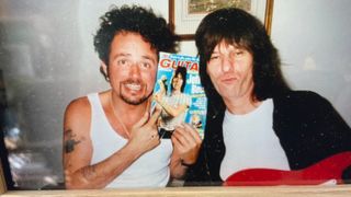 Luke and Jeff in 1997. Luke is holding the November 1997 issue of 'Guitar Techniques,' featuring Beck and Jennifer Batten 