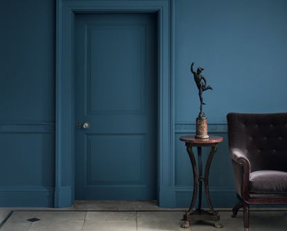 should doors be painted the same color as walls, dark blue hallway by Paint & Paper Library
