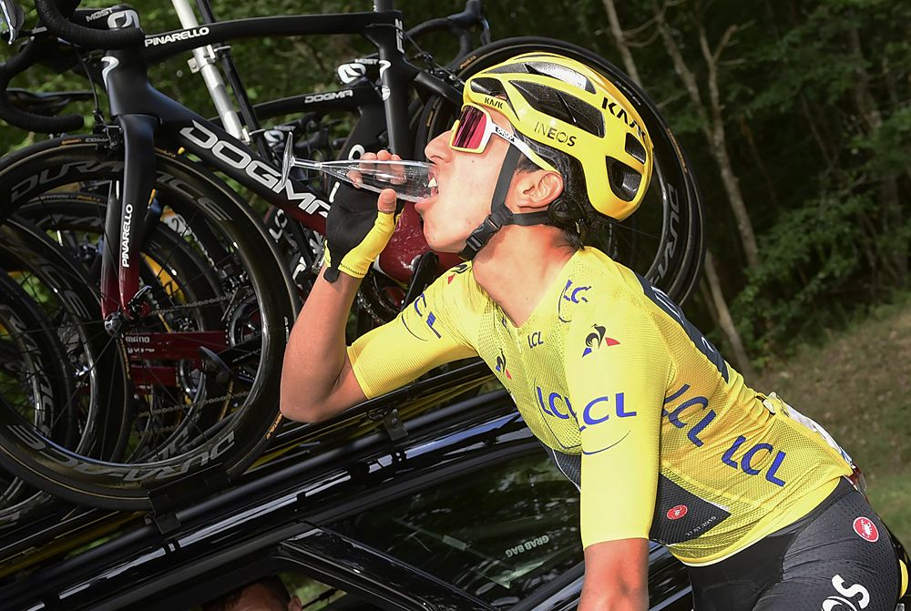 Overall winner Egan Bernal (Team Ineos) takes a well-deserved sip of champagne during stage 21 at the Tour de France
