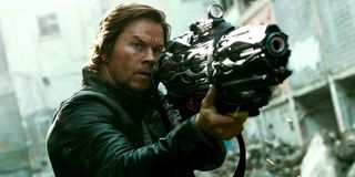 Mark Wahlberg holding a huge gun