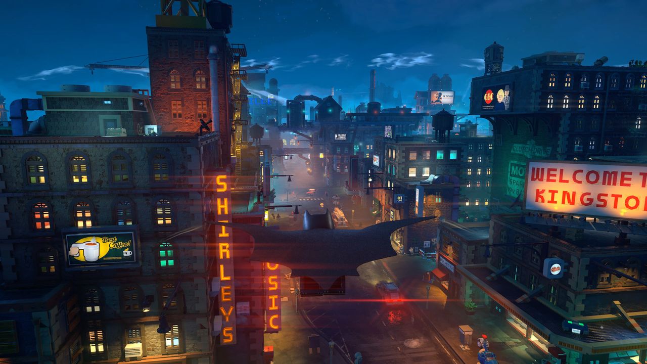 Batman glides above Gotham City in Lego Batman: Legacy of the Dark Knight