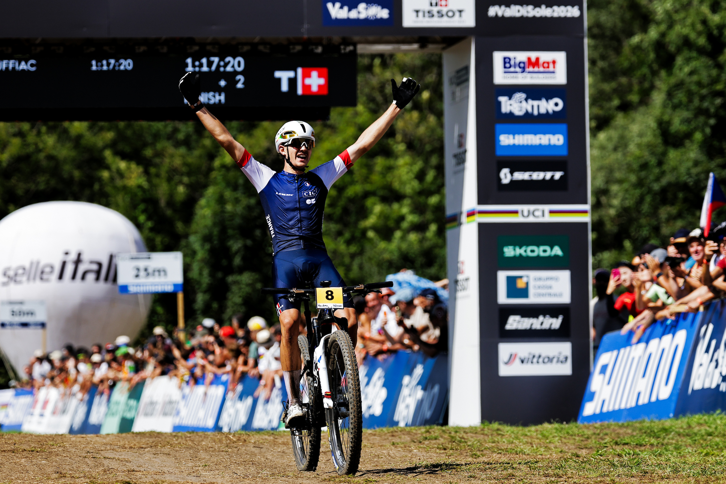 Nael Rouffiac celebrates winning the under-23 Cross-country Olympic (XCO) world title