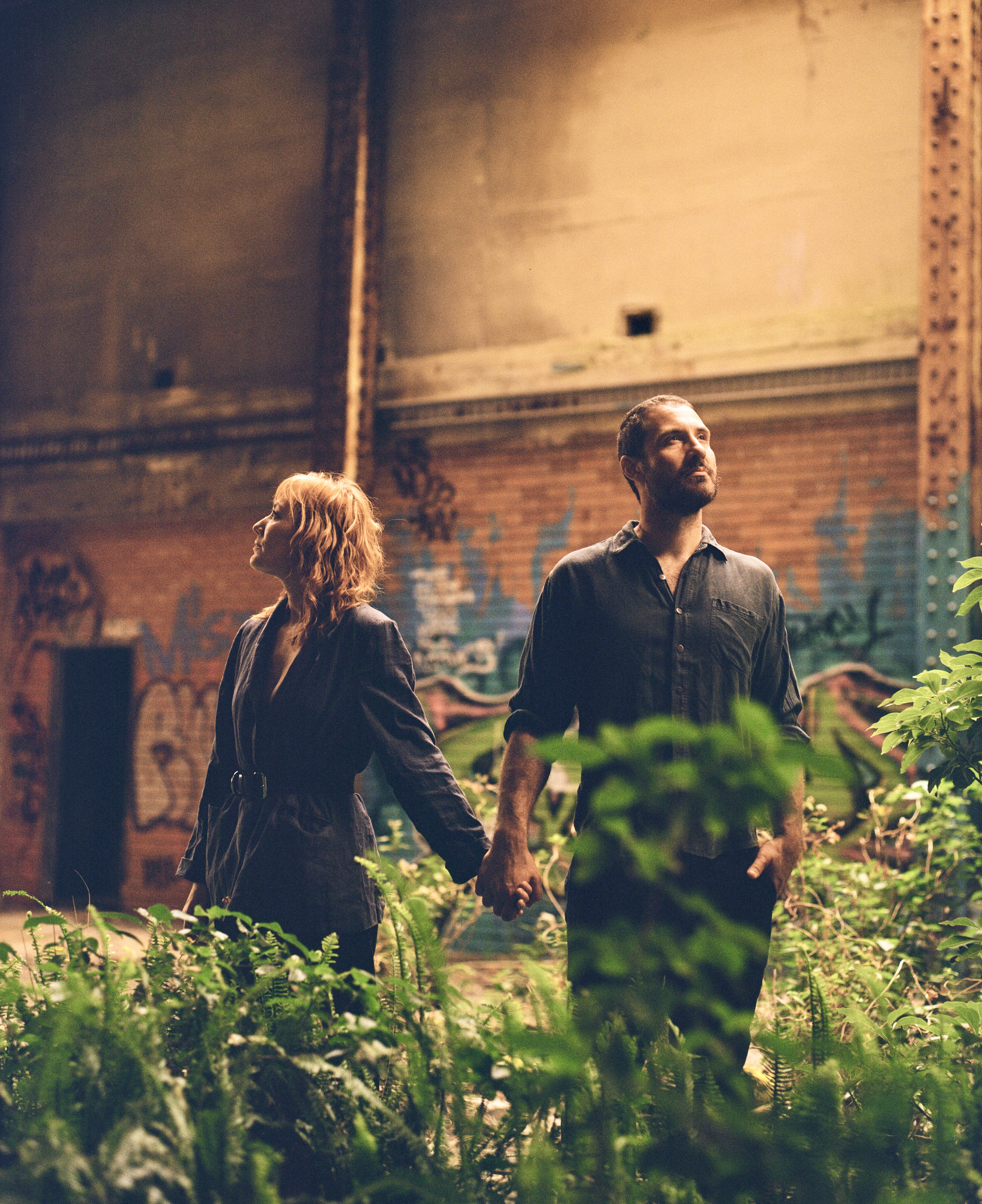 William Crighton and Julieanne Crighton standing among plants