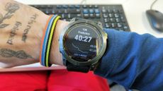 Garmin Enduro 2 showing 10k race time prediction