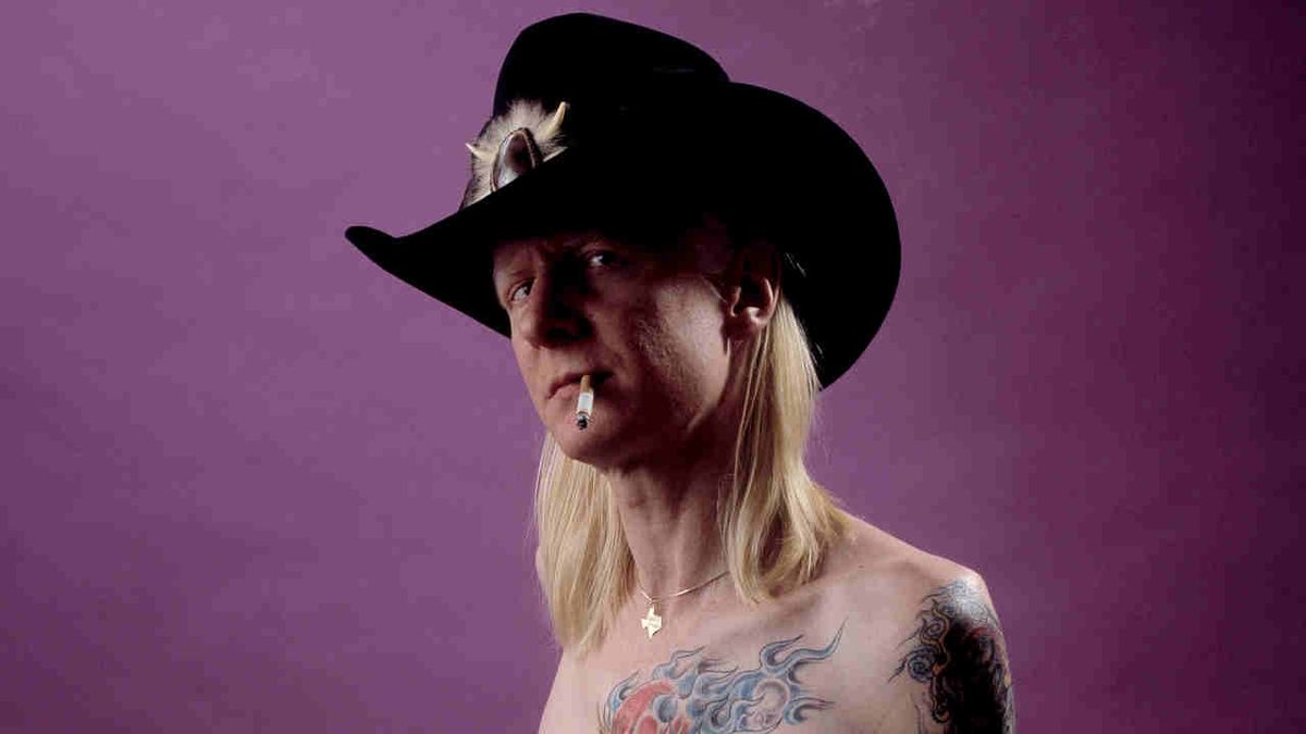 Johnny Winter posing for a photograph in 1984