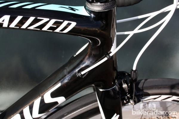 We've long noted the use of these little rubber nubs to protect the paint on Quick Step team bikes.