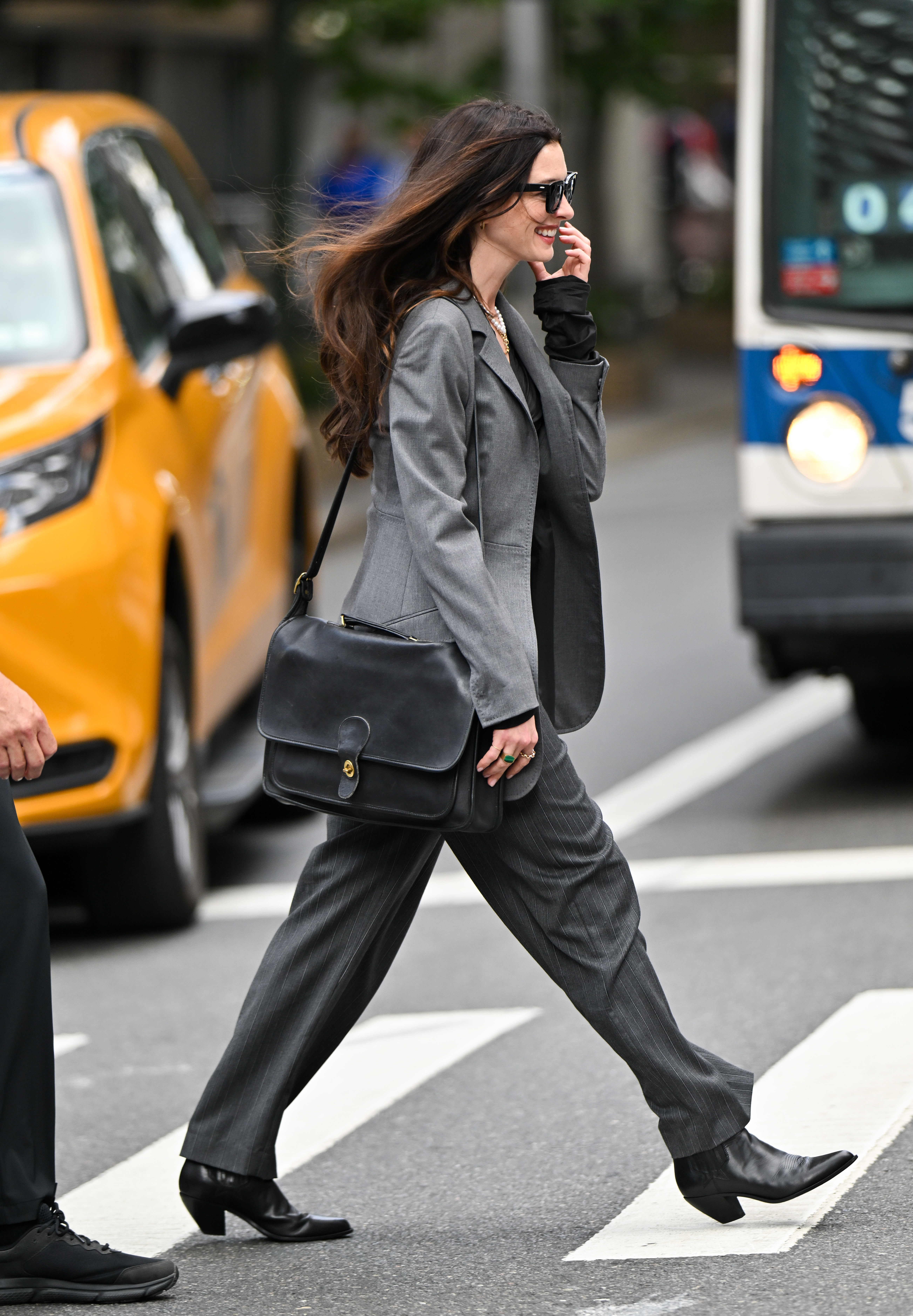 Anne Hathaway carried a Coach bag on the Devil Wears Prada 2 set