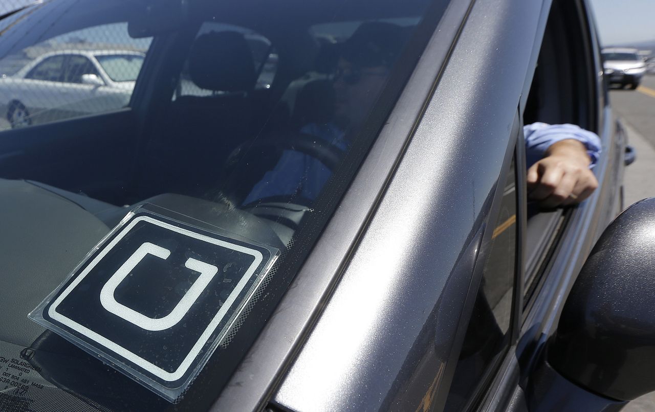 An Uber driver waits in San Francisco.