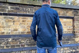 Image shows the rear of the Altura Grid Field Jacket