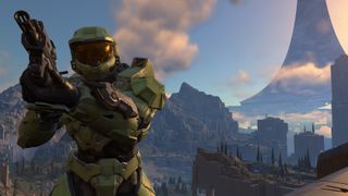 Master Chief holding a gun and looking off screen
