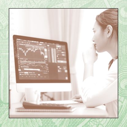 Woman checks stock market performance