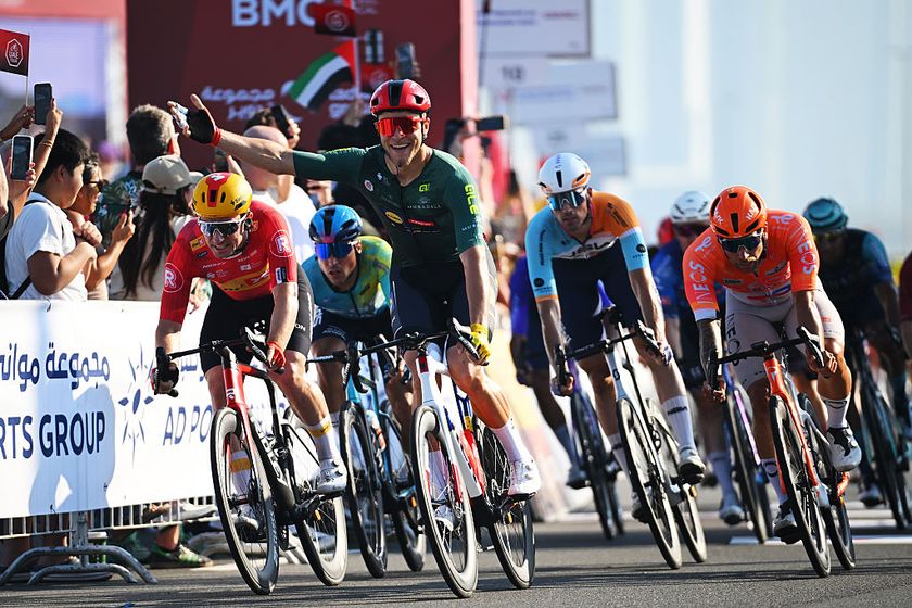 ABU DHABI, UNITED ARAB EMIRATES - FEBRUARY 22: Jonathan Milan of Italy and Team Lidl - Trek - Green Points Jersey celebrates at finish line as stage winner (C) ahead of Erlend Blikra of Norway and Team Uno-X Mobility (L) and Sam Welsford of Australia and Team INEOS Grenadiers (R) during the 8th UAE Tour 2026, Stage 7 a 149km stage from Zayed National Museum to Abu Dhabi Breakwater / #UCIWT / on February 22, 2026 in Abu Dhabi, United Arab Emirates. (Photo by Tim de Waele/Getty Images)