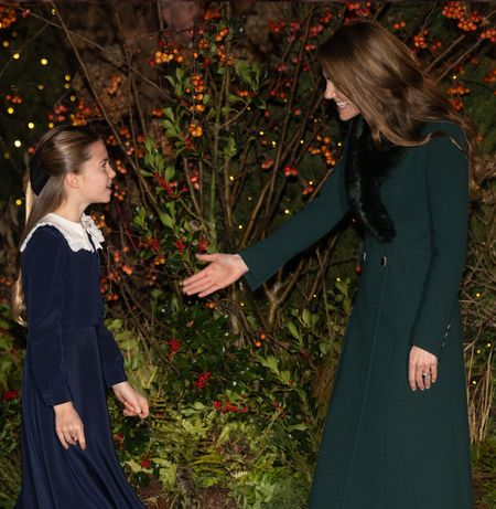 Princess Kate greeting Princess Charlotte at the Together at Christmas concert