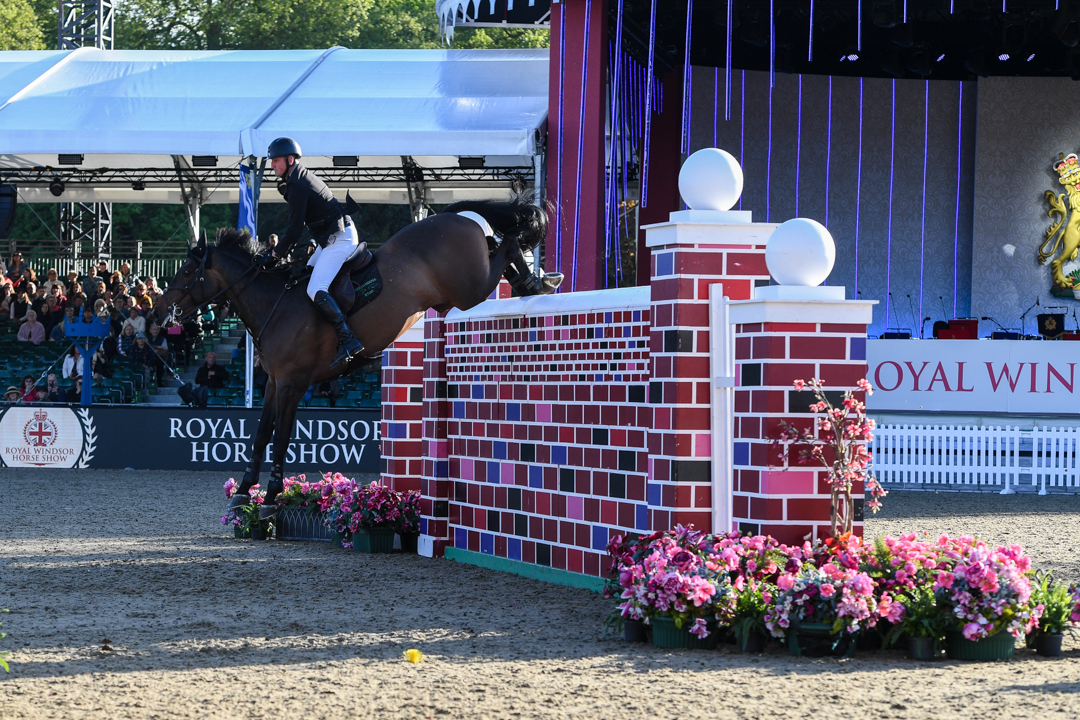 Derek Morton and KBS High Quality winning the puissance at Royal Windsor Horse Show