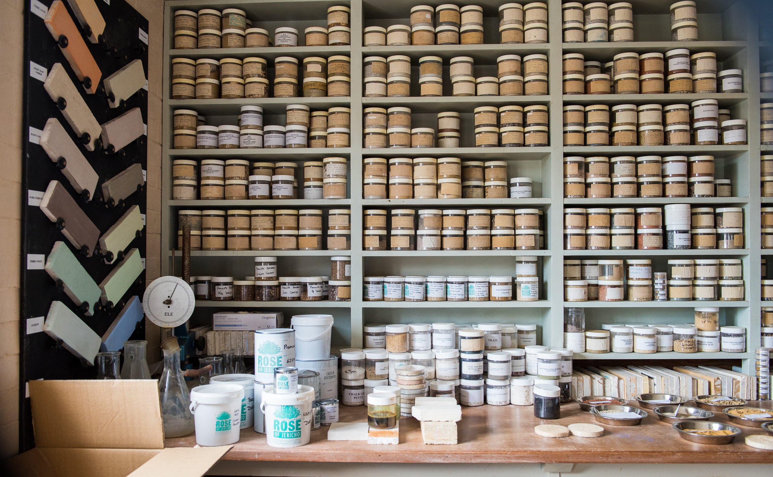 Shelves of paint pots