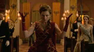 A Fjerdan woman holding her arms up about to use her powers in Shadow and Bone