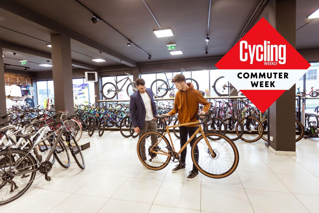 A customer chooses a bike in a shop