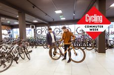 A customer chooses a bike in a shop
