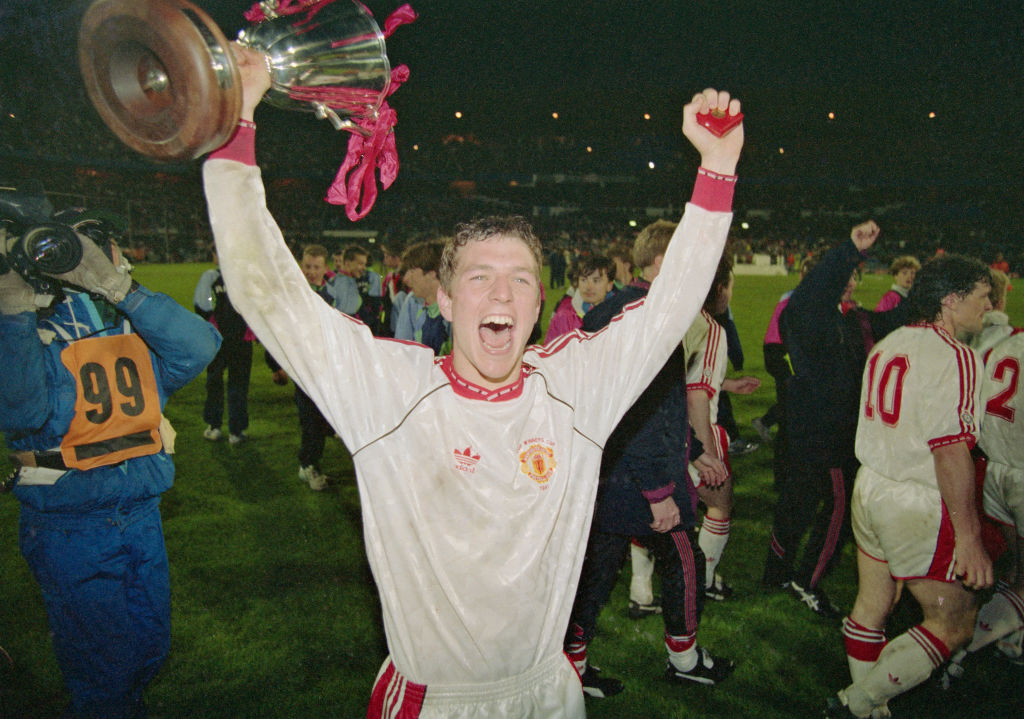 ROTTERDAM, NETHERLANDS - MAY 15: Manchester United player Lee Sharpe celebrates with the trophy after the 1991 European Cup Winners Cup Final between Manchester United and Barcelona on May 15th, 1991 in Rotterdam, Holland. (Photo by Simon Bruty/Allsport/Getty Images)