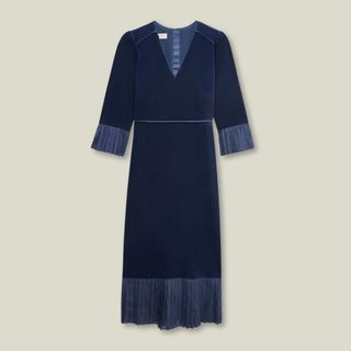 A cutout of the Hobbs blue Mary Velvet Dress against a beige background