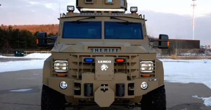 Watch a tiny Wisconsin town justify using an armored vehicle to collect $86k from an old man