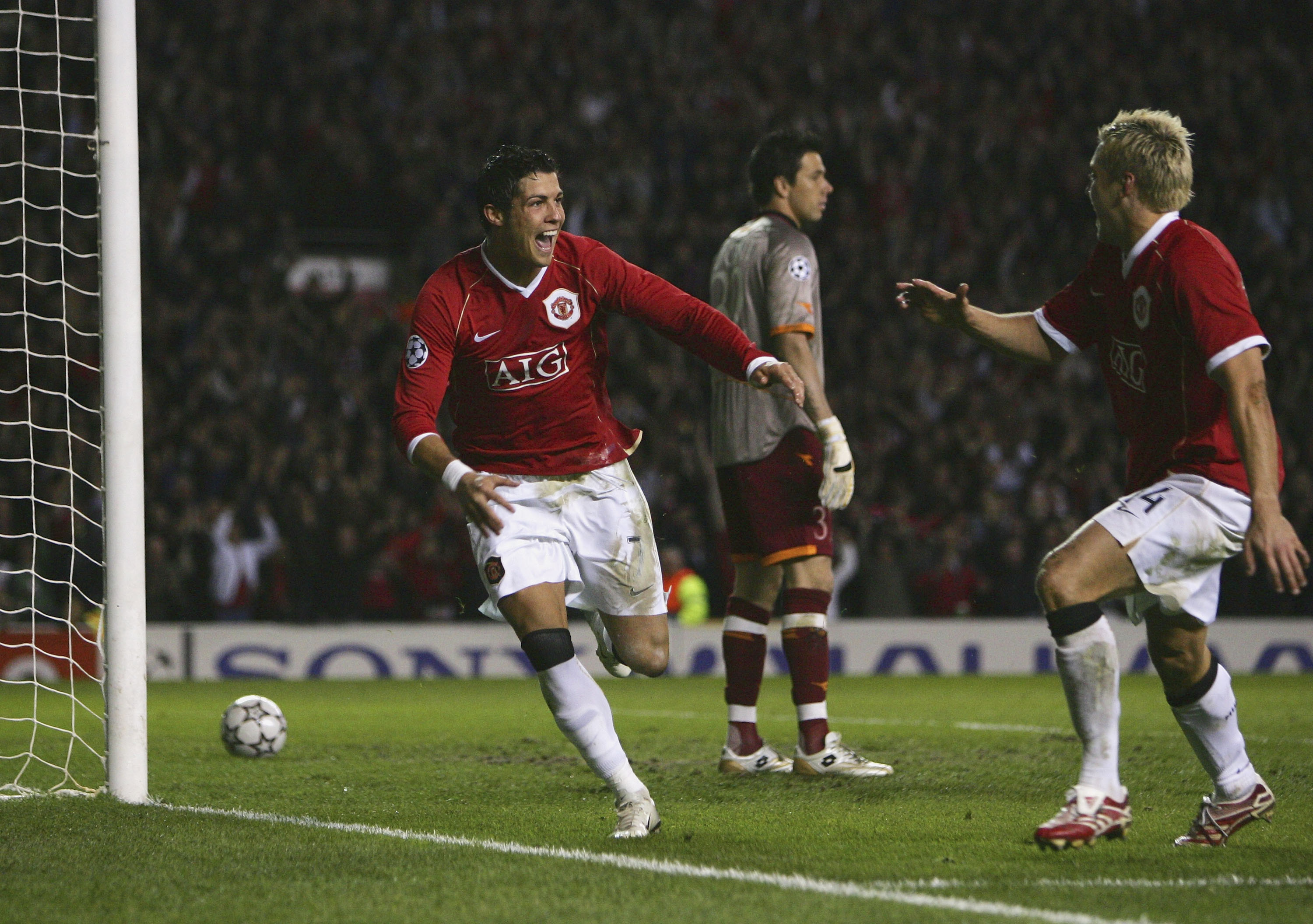 Cristiano Ronaldo celebrates with Alan Smith after scoring Manchester United's fifth goal against Roma in the teams' Champions League quarter-final second leg at Old Trafford in April 2007.