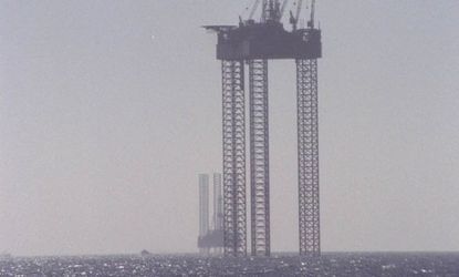 A oil and gas rig is anchored in the Gulf off the coast of Louisiana