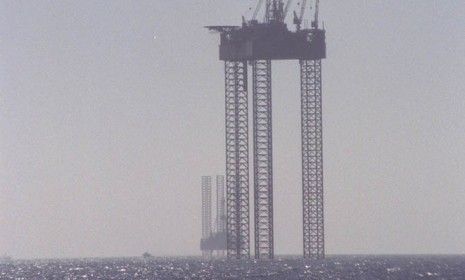 A oil and gas rig is anchored in the Gulf off the coast of Louisiana