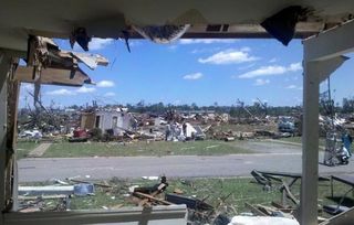 The view from the door of a damaged home in Tuscaloosa, Ala.