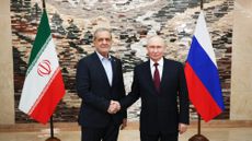 Russian President Vladimir Putin (R) meets with Iranian President Masoud Pezeshkian (L) on the sidelines of the Shanghai Cooperation Organization summit in Bishkek, Kyrgyzstan.