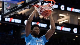 The North Carolina Tar Heels' Jalen Washington dunking the basketball