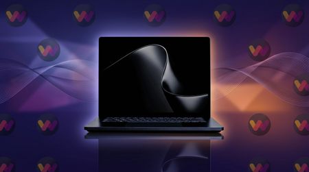 Surface Laptop Ultra with a dark, elegant design sits against a vibrant background of swirling purple and orange waves, creating a futuristic and stylish atmosphere.