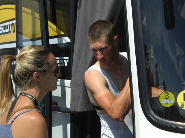 A half-dressed Mark Renshaw chats at the start