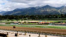 Horses and riders are on the track at Santa Anita Park in Arcadia, California, the site of the equestrian events at the LA28 Olympic Games