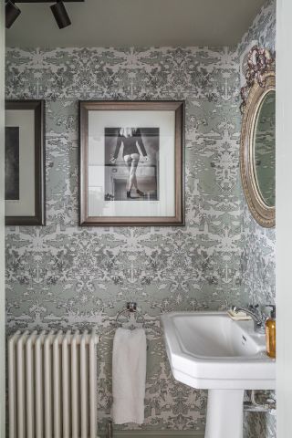 gray wallpapered powder room