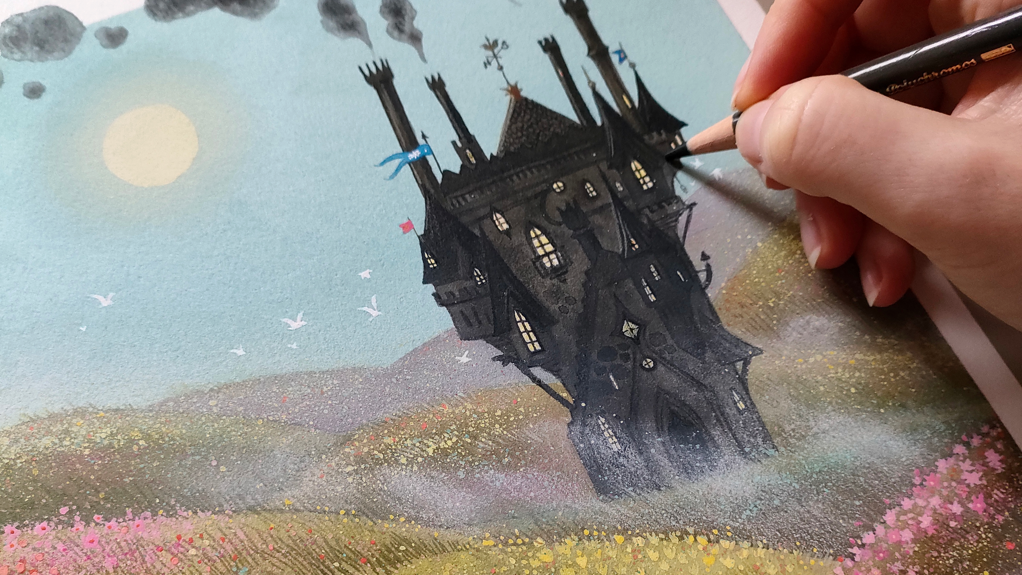 Artist in residence; close-up of an artist working with a coloured pencil