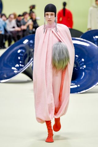 pink Jil Sander coat circa fall 2024 in Milan