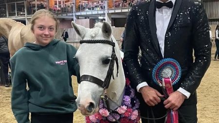 Millie Rackham, Overley Gamebird and Justin Hollis stand facing the camera for a photo.