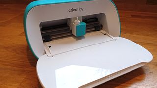 Cricut Joy review; a small digital craft machine it's panel open, for a Cricut Joy review