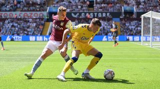 Nathan Patterson of Everton and Lucas Digne challenge for the ball during the Premier League match between Aston Villa and Everton at Villa Park.