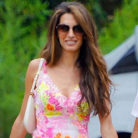Amal Clooney on vacation in a vintage versace dress